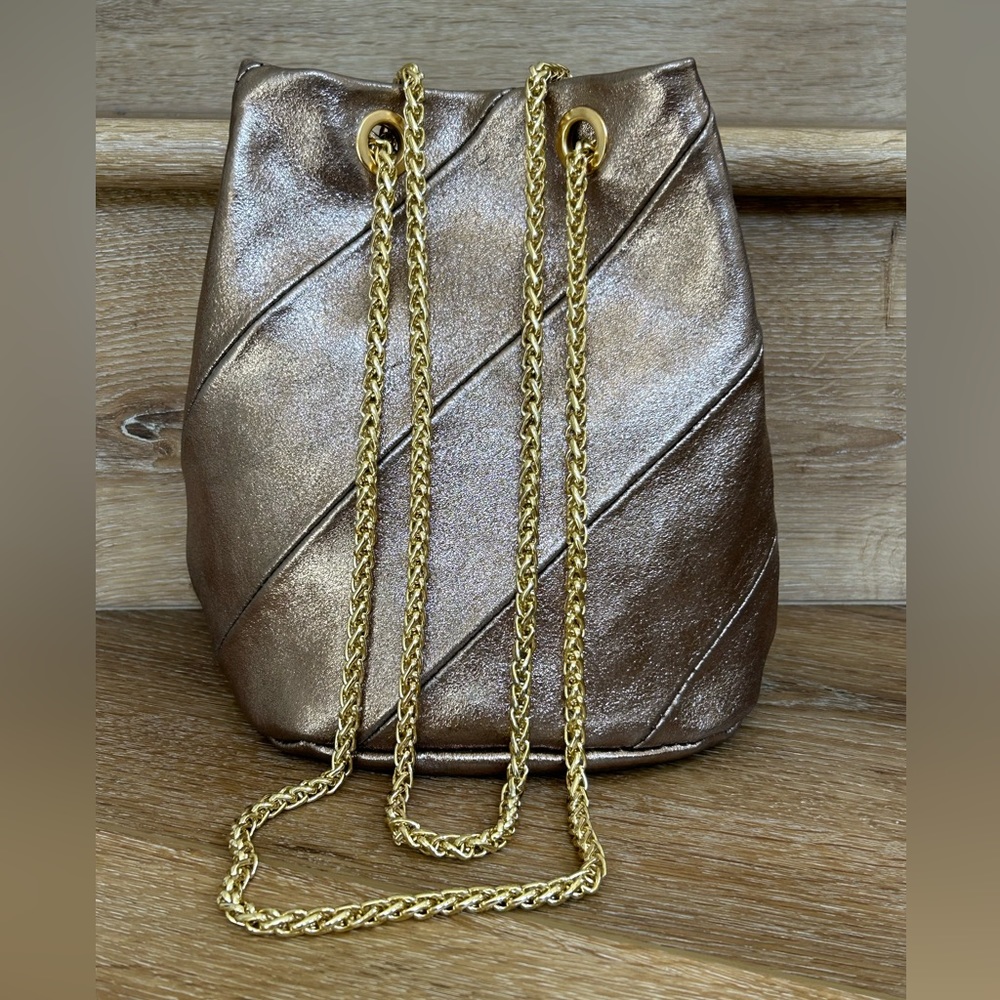 Metallic Bronze Drawstring Crossbody Bag with Gold Chain